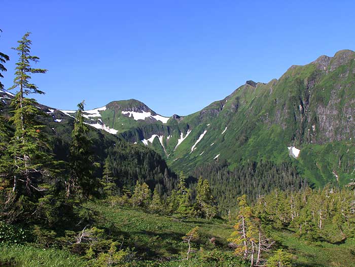 Hiking and sightseeing Adventure Alaska on Prince of Wales Island. Mountain scenery. Fishing and hunting vacation packages.