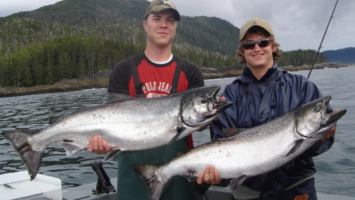 Thorne Bay King Salmon fishing. Prince of Wales Island's Adventure Alaska Southeast fishing charters. Two men holding giant King Salmon caught on guided fishing charter.